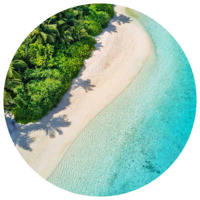 Aerial view of stunning blue water and white sand, the perfect place for a luxury honeymoon