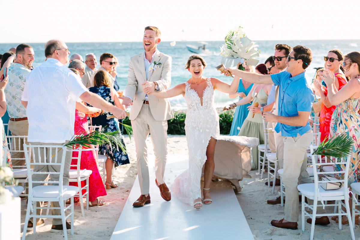a couple gets married on the beach at Sandals Royal Curacao
